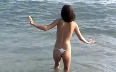 Girl Skinnny Dipping In The Ocean