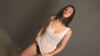 Sexy brunette with nice tits in wet t-shirt