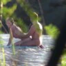 Blonde fucked from behind on beach seen by voyeurs