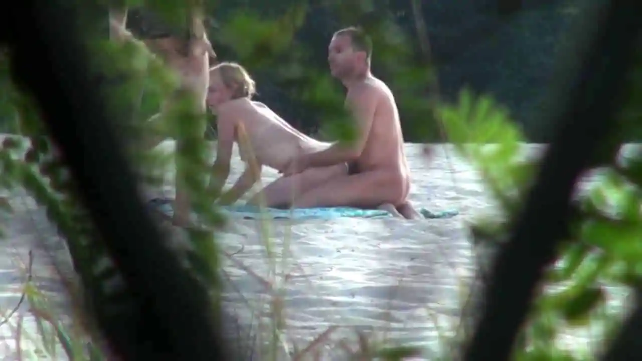Stranger asks couple having sex on the beach if he can join in.