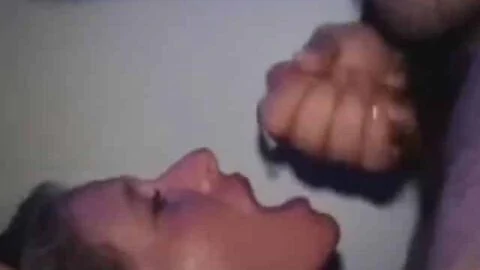 cumslut drinking cum at glory hole