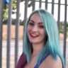 Smiling Punk Girl Dogging At Beach
