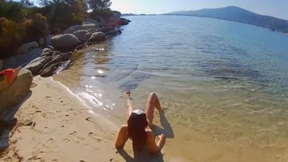 Woman Relaxing Nude On The Beach